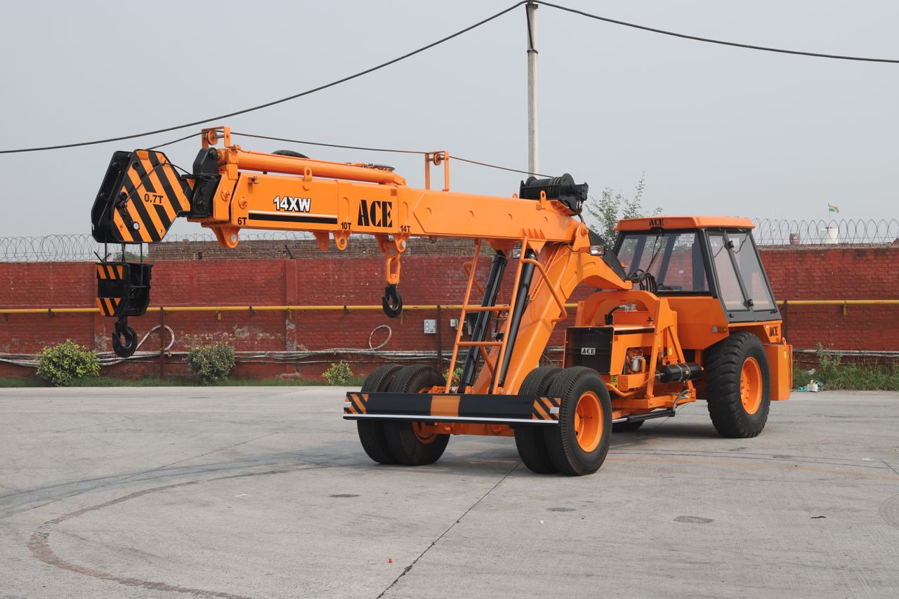 hero-img-01 Orange ACE 14XW mobile crane in an industrial outdoor setting in India.