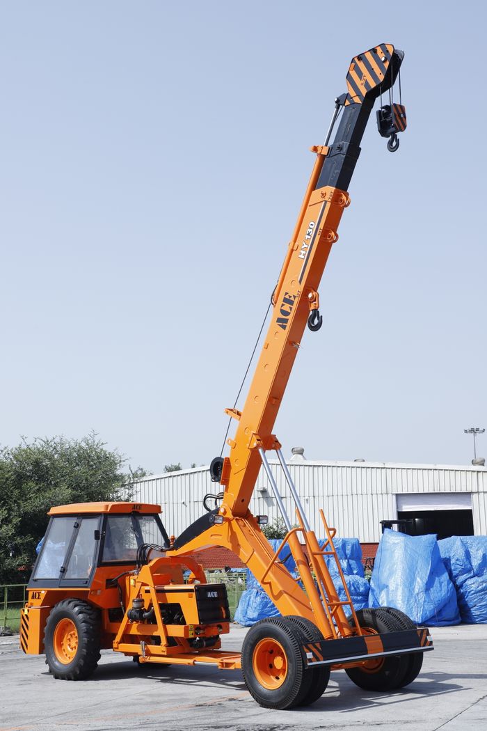 gallery-1 Orange ACE HY130 mobile crane in an outdoor construction setting